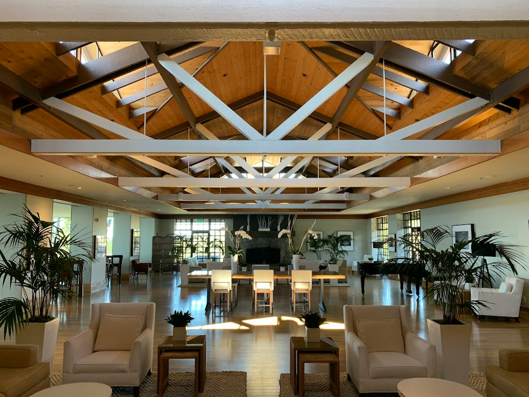 Photo transitional woven bamboo wall sconce hotel lobby